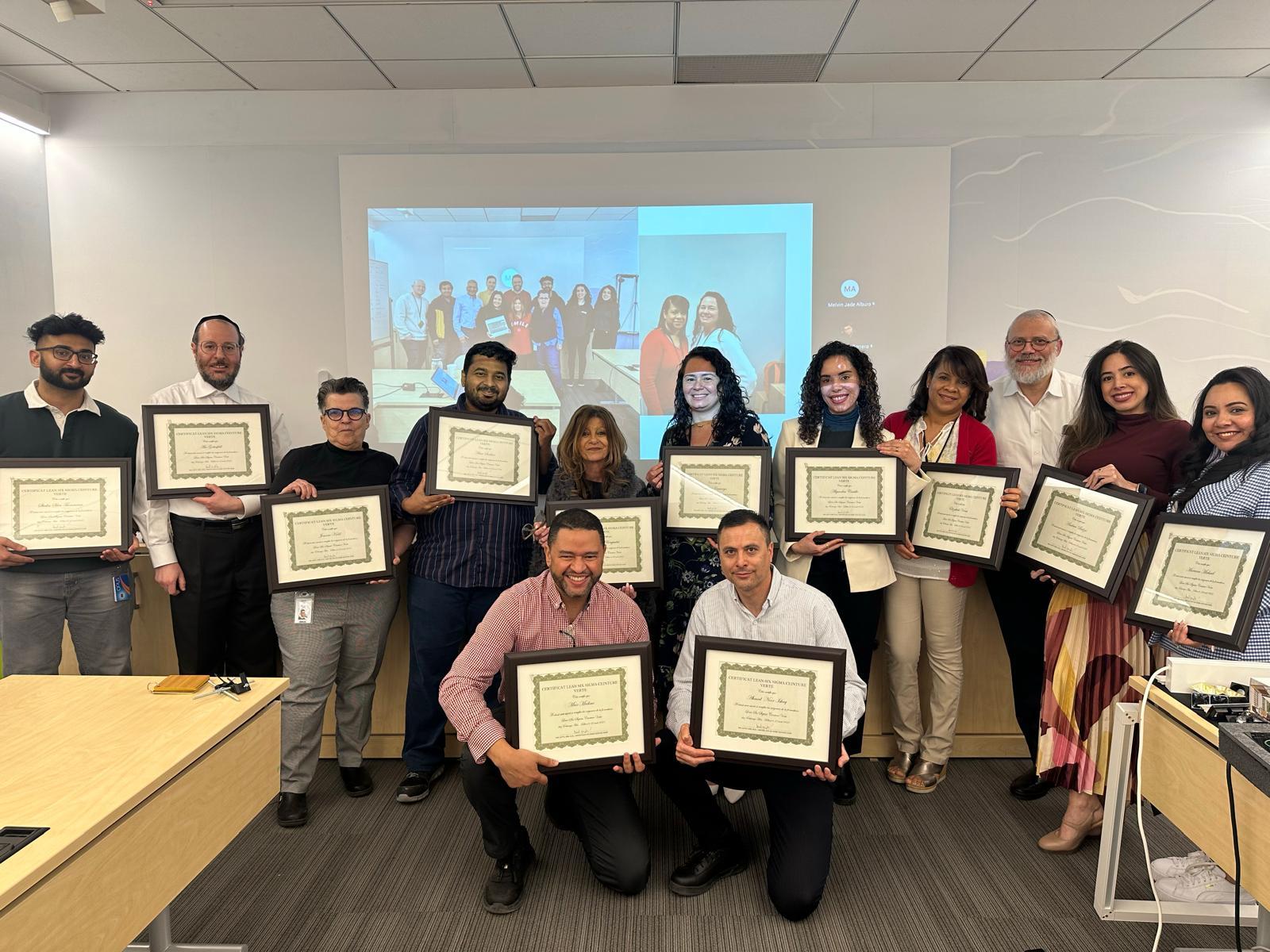 Lean Six Sigma Green Belt certification group photo with CEO
